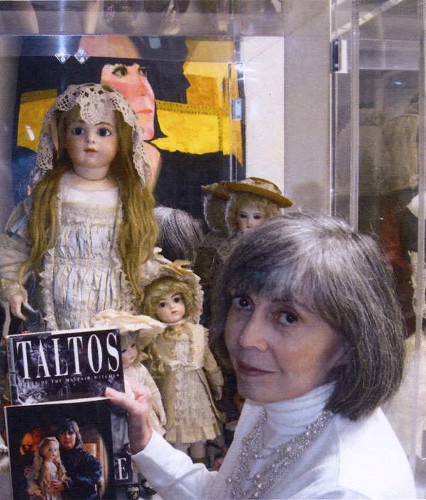 Author Anne Rice pictured with some of her beloved antique dolls to be sold by auction house Theriault's on July 18th in Chicago.