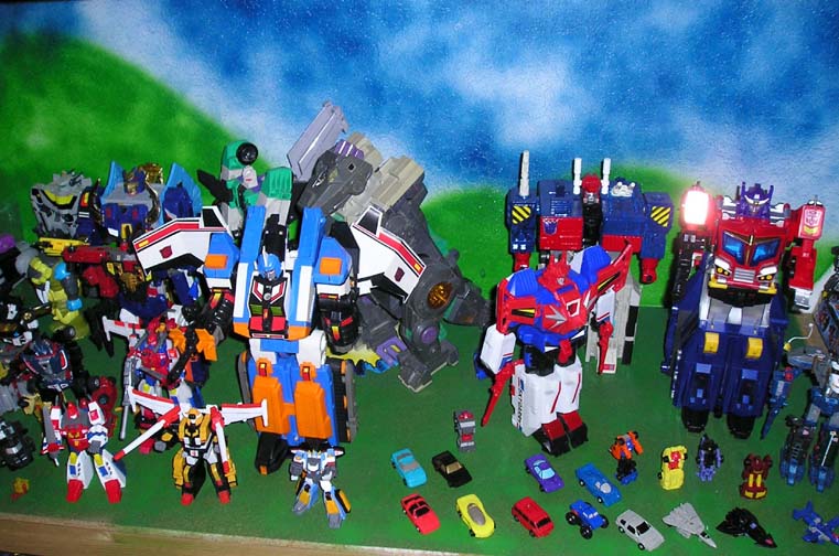 Трансформеры зона. Игрушка (трансформер). Оптимус Автобот игрушка. Transformers Zone dai Atlas.